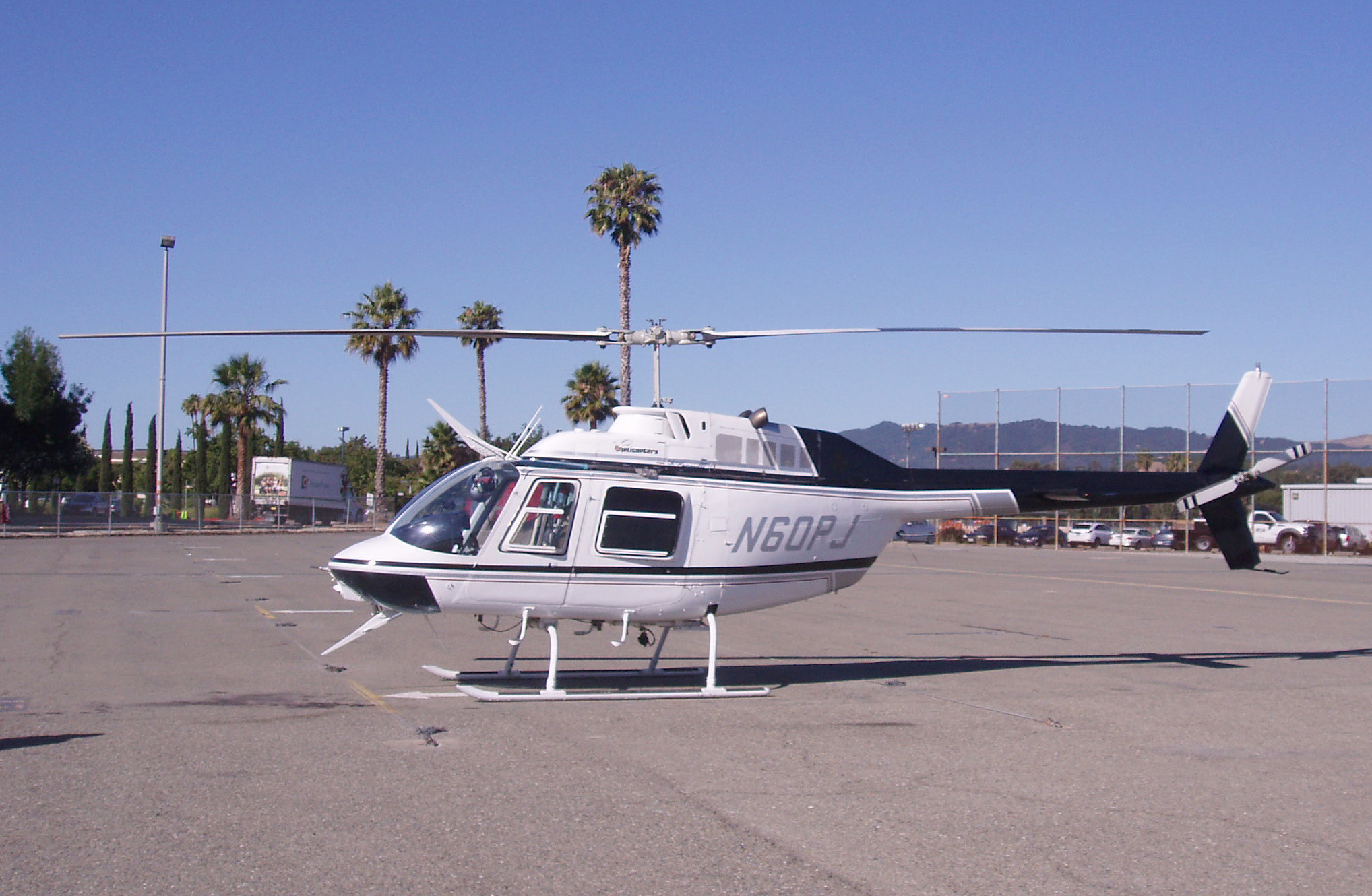 A Bell 206 JetRanger helicopter in flight